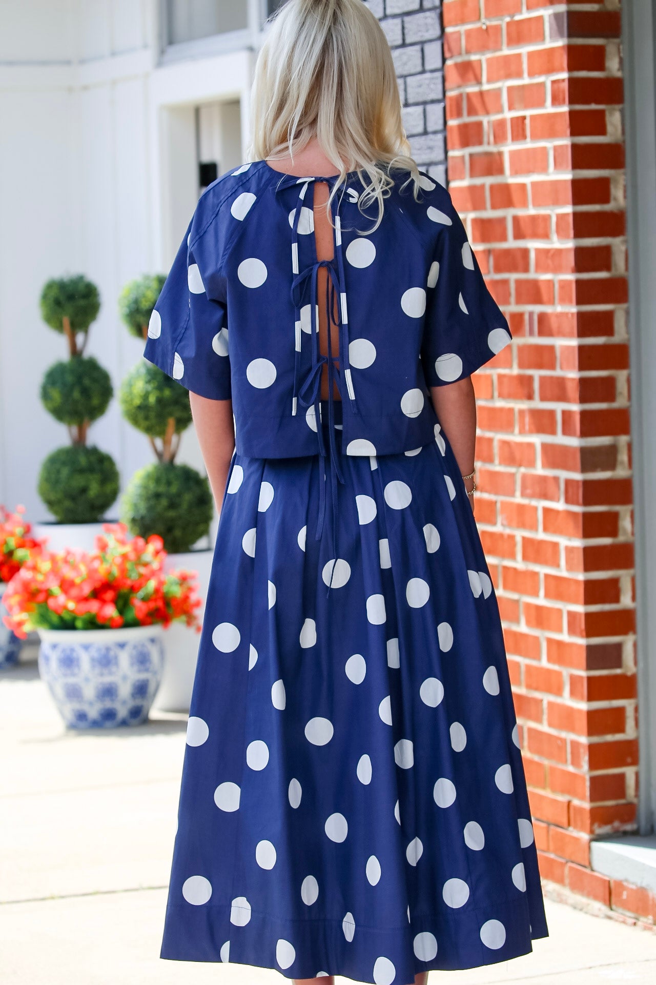 Polka Dot Pleated Midi Skirt in Navy