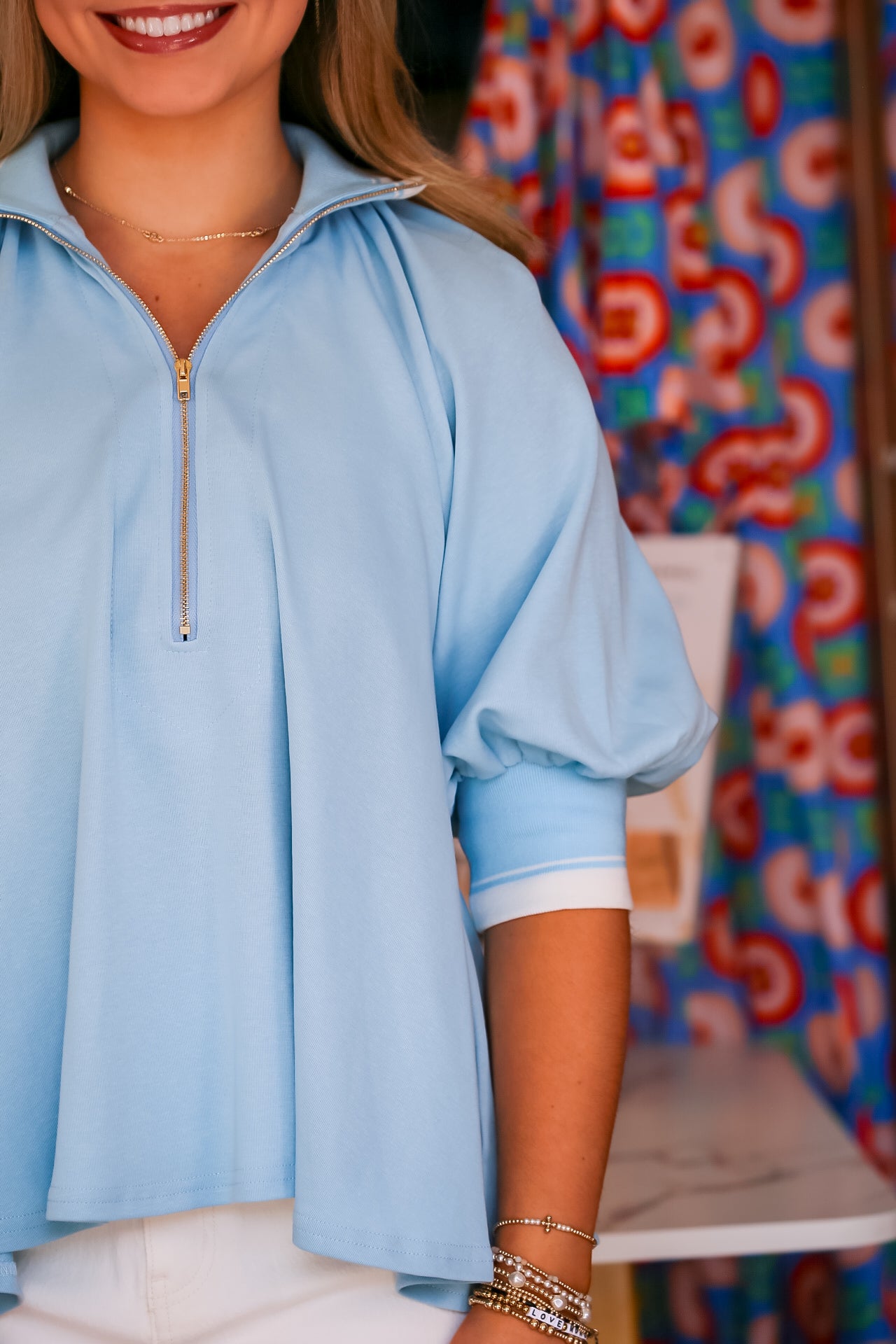 Mock Neck Half Zip Puff Sleeve Top in Blue